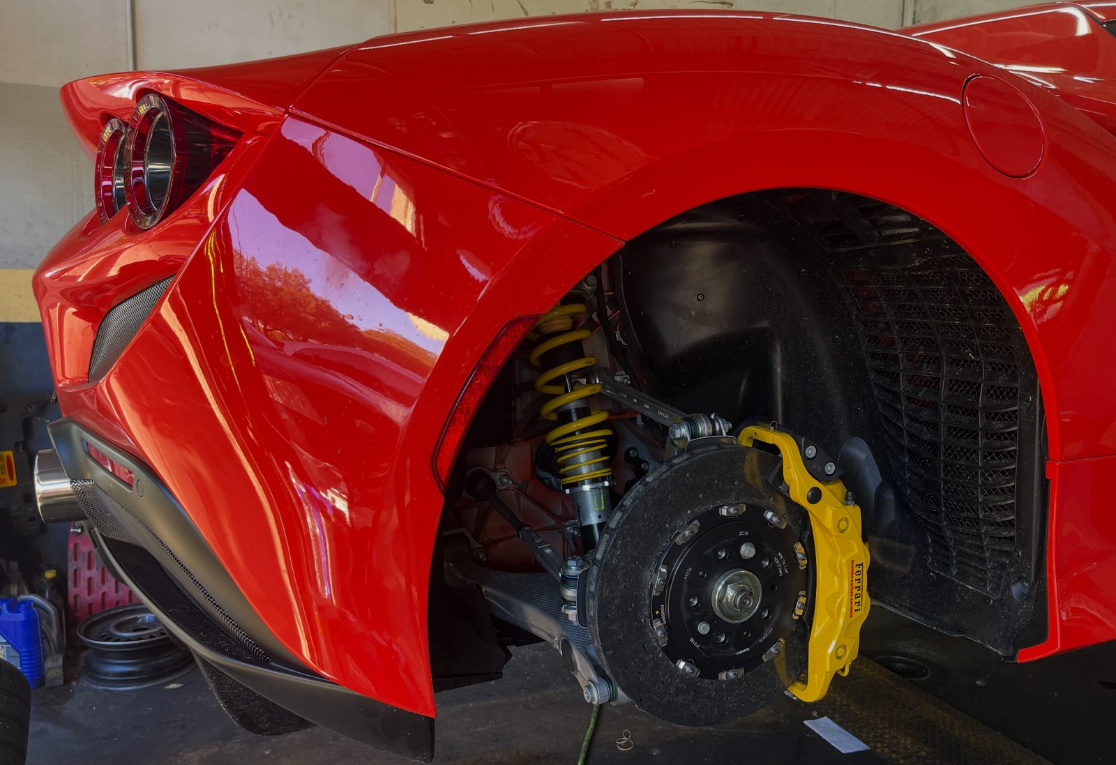 Carbon-ceramic brake service on a Ferrari F8